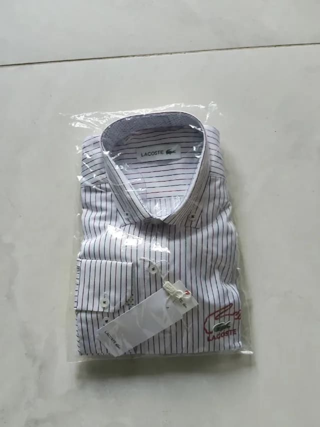 Camasa in dungi Lacoste M nouă