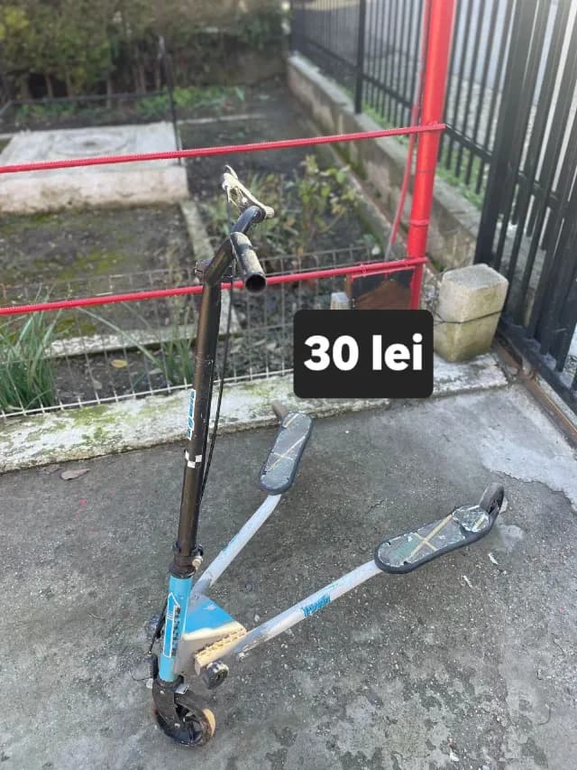 Trotineta cu trei roți