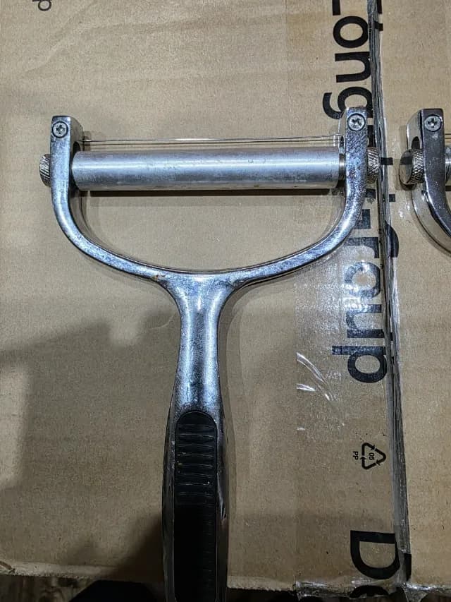 Feliator manual reglabil pentru branzeturi 2 bucati.
